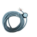 Coiled gray industrial sensor cable with exposed wires and a black circular sensor head labeled FLID DP-0C