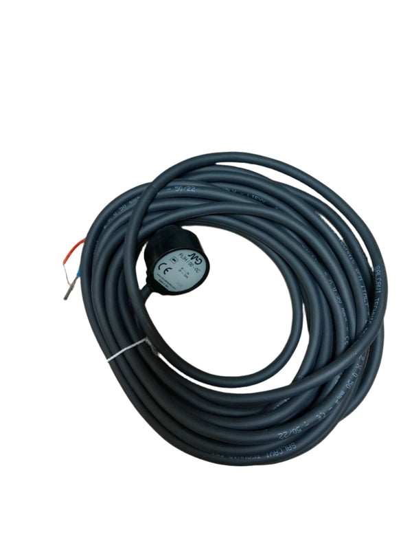 Coiled industrial sensor cable with FLiH 00-0C sensor module and exposed wire ends for manufacturing automation