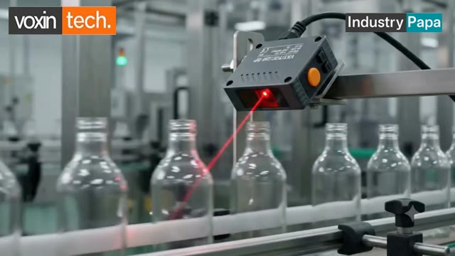 VXT/TOF/2M-BP laser sensor on clear bottles